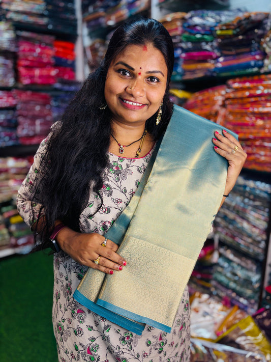 Plain tissue sarees with Kanchi borders