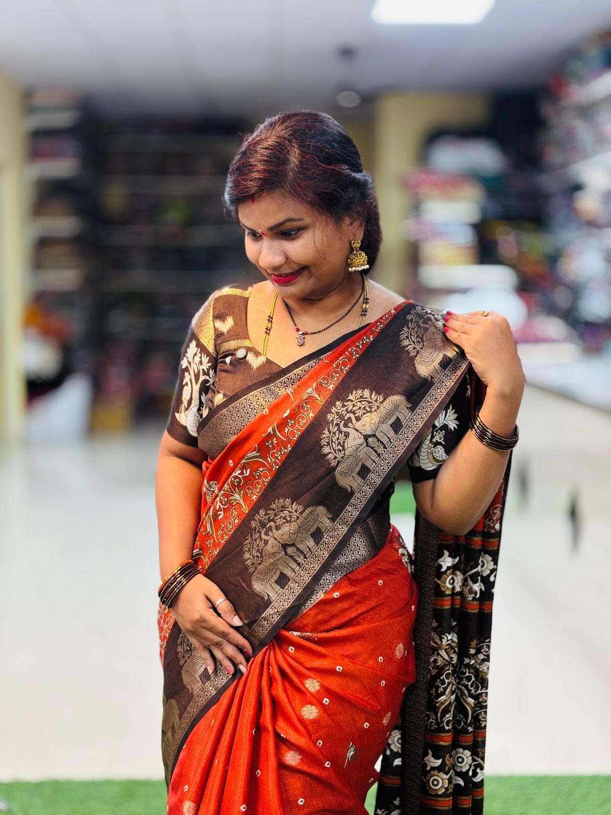 Rust Orange Kanchi Pattu Sarees