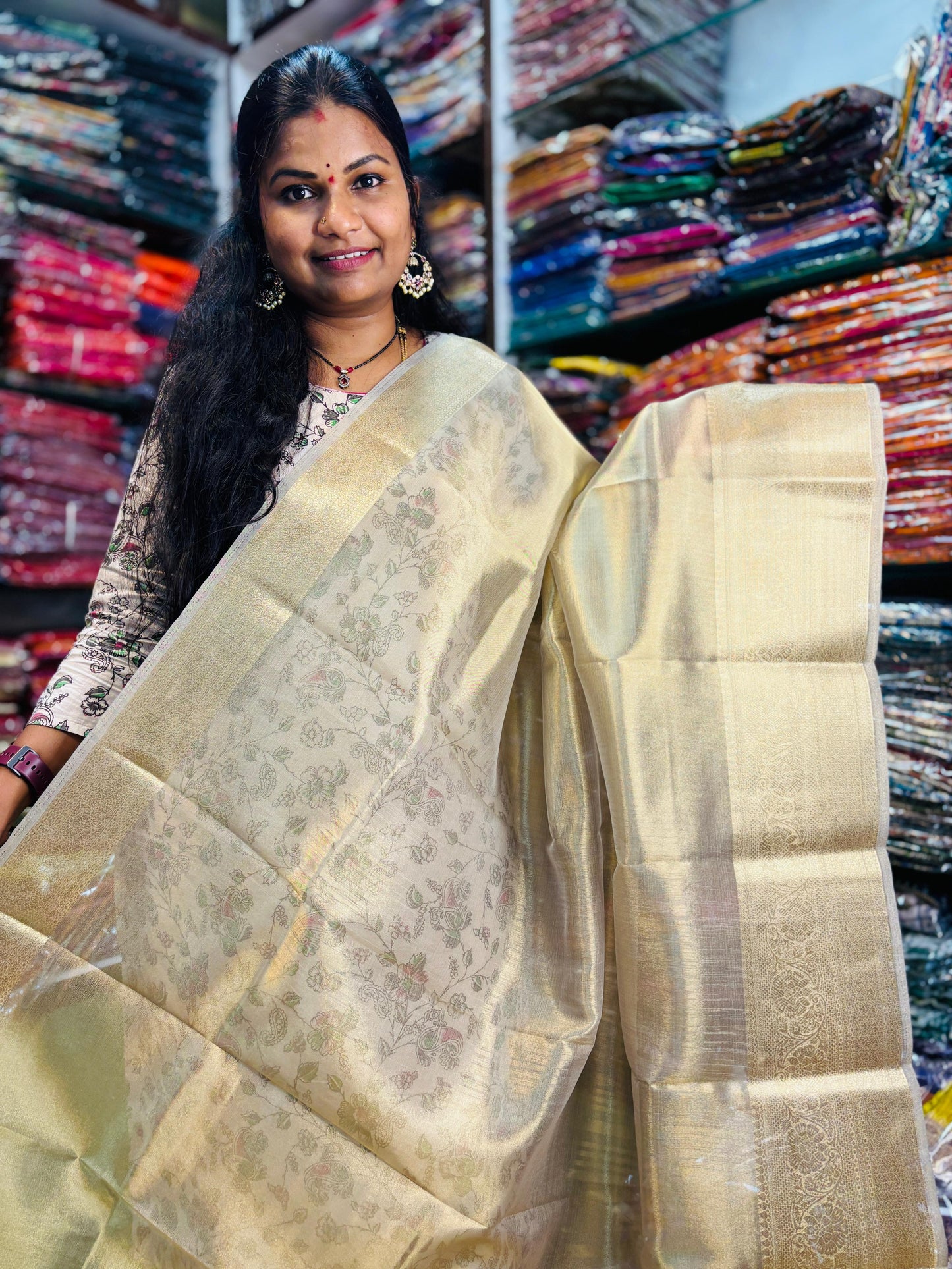 Plain tissue sarees with Kanchi borders
